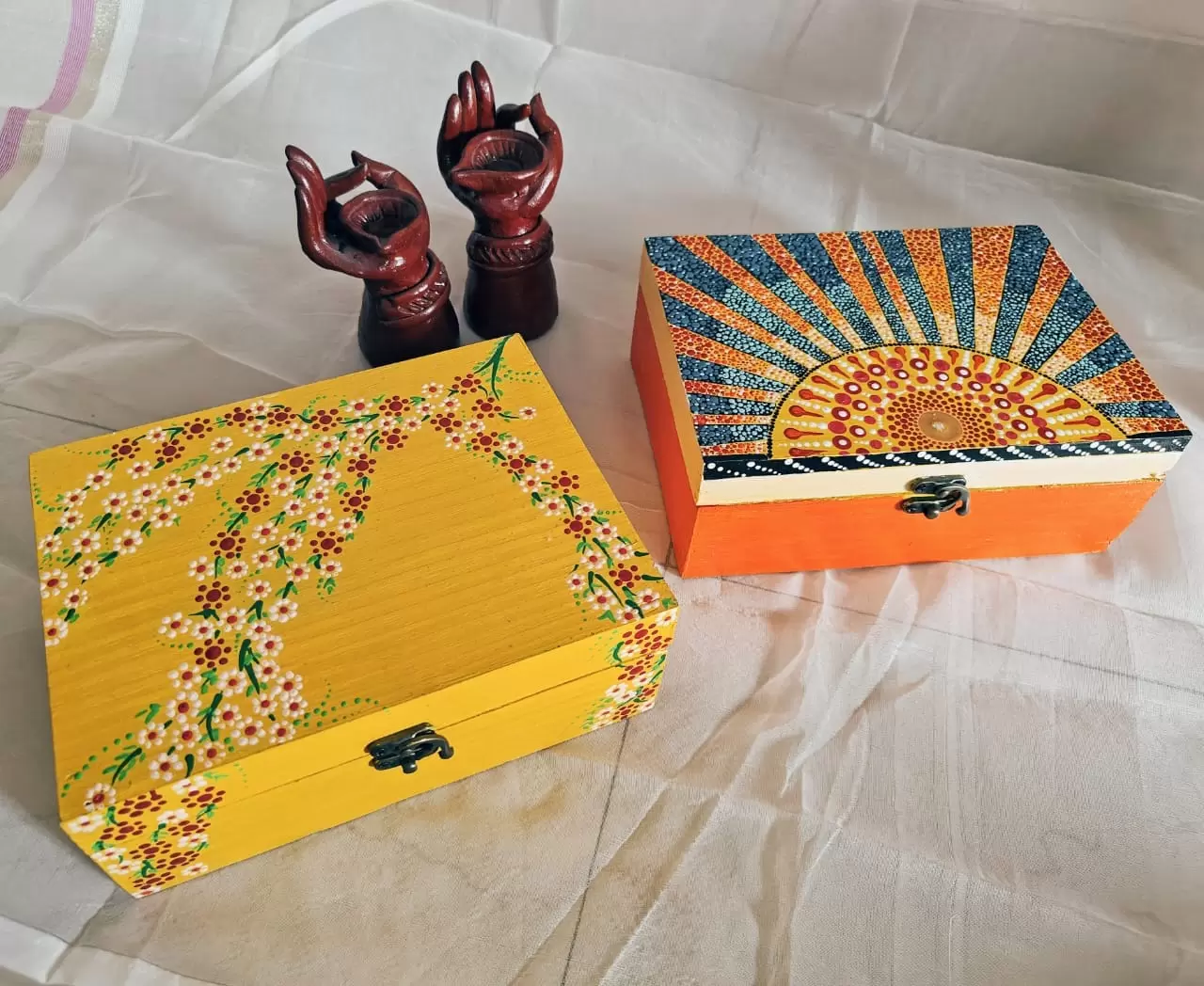 hand-painted Indian art on wooden boxes